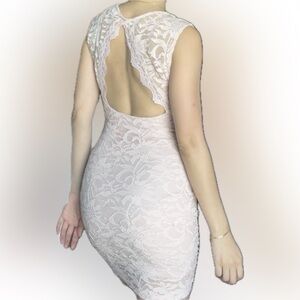 Pink lace bodycon dress with open back